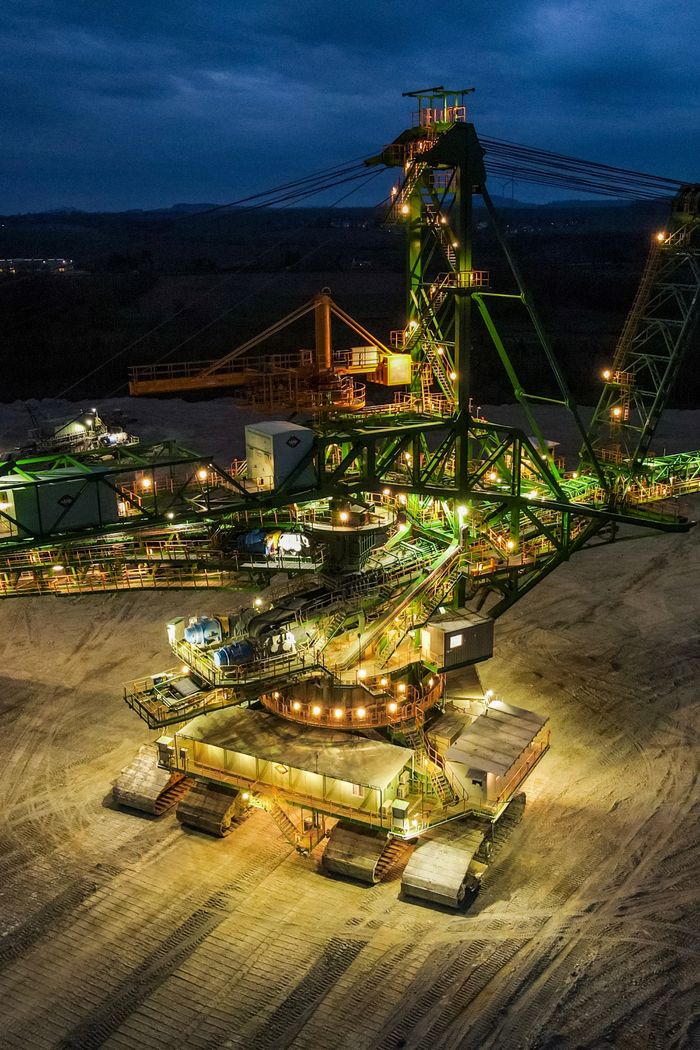 Home Night view of massive industrial excavator in Bogatynia, Poland.